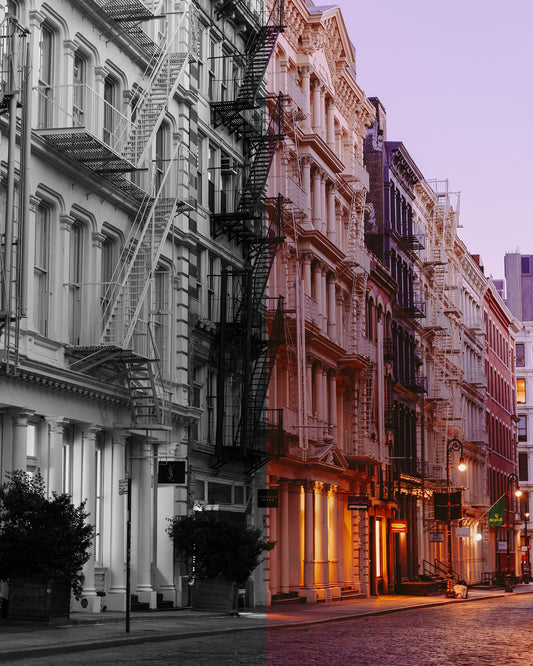 Empty SoHo street at sunset, half black and white and half in color